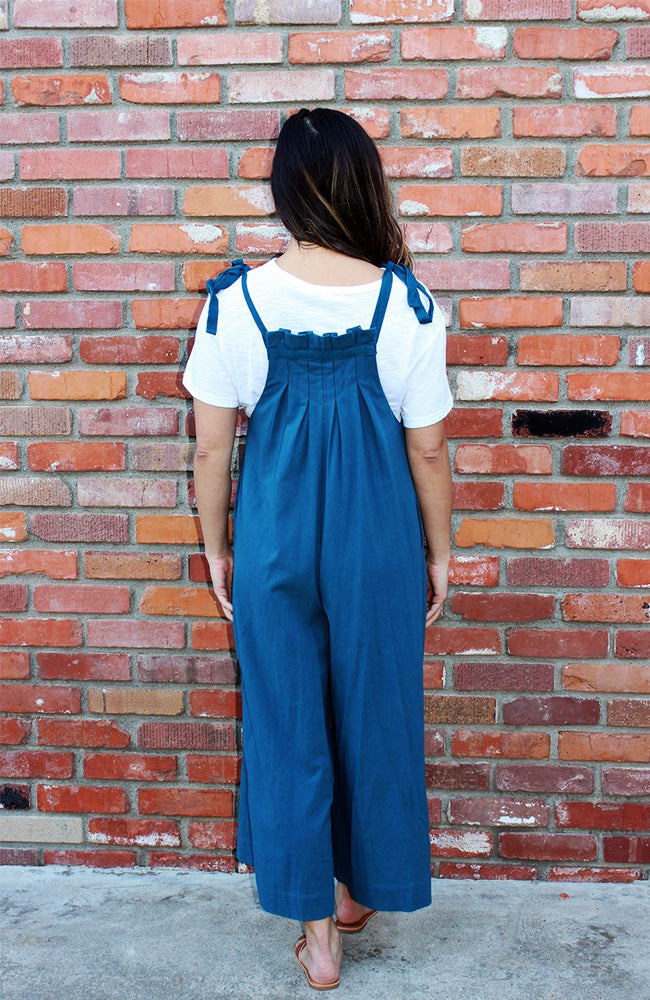 Teal Jumpsuit With Tie Shoulder Straps, Culotte Length, And Wide Leg Silhouette