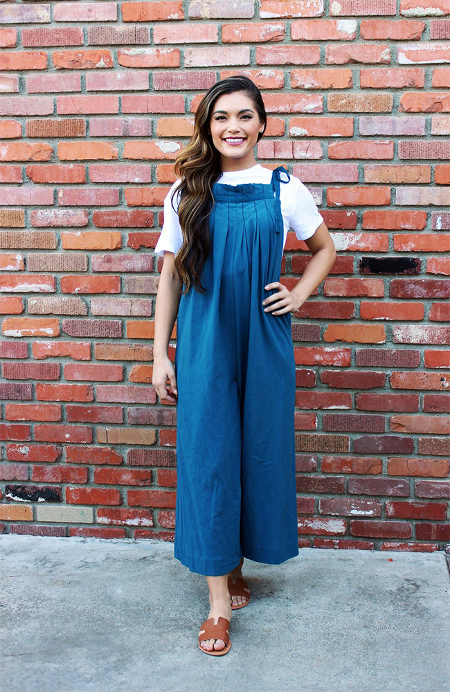 Teal Jumpsuit With Tie Shoulder Straps, Culotte Length, And Wide Leg Silhouette