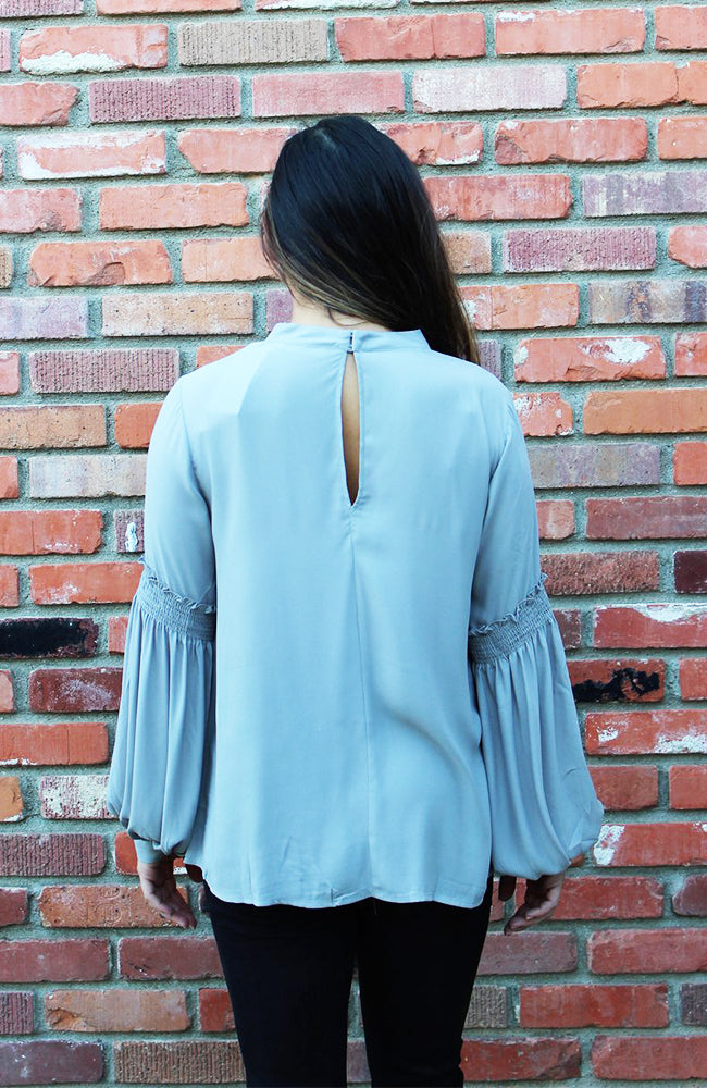 Grey Long Sleeve Blouse With Cutout V Neckline And Billowy Sleeves
