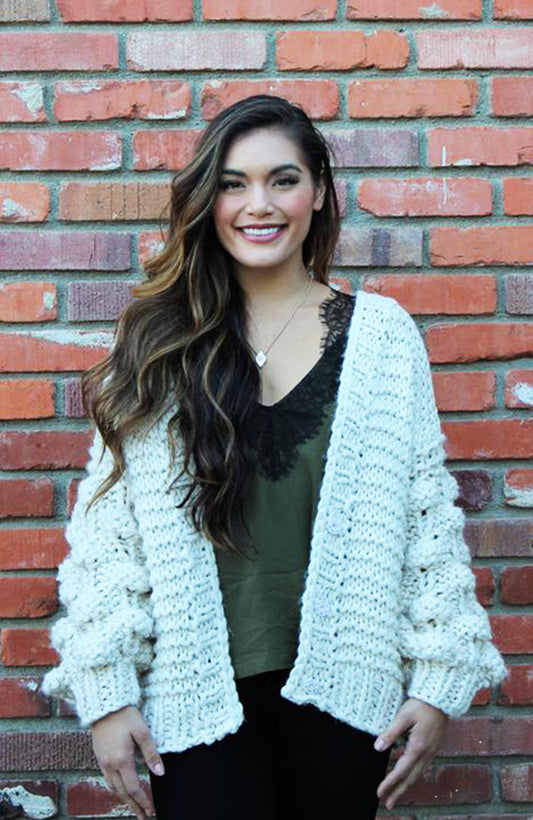 Hand Knit Pom Pom Cardigan In Ivory